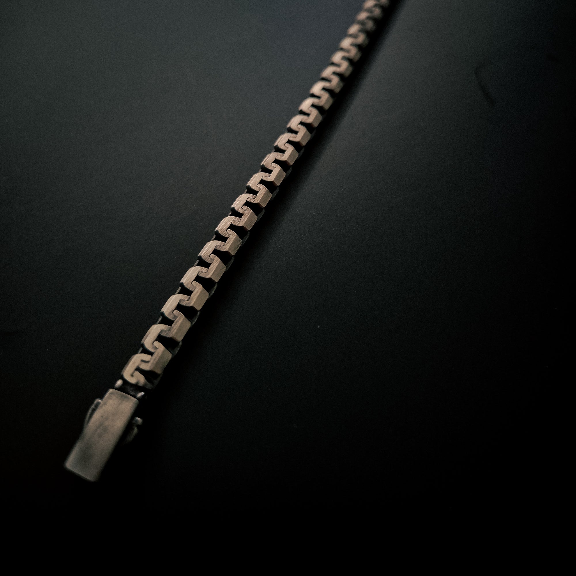 [full] - Industrial-style sterling silver bracelet with ruthenium plating and brushed gun-metal finish.